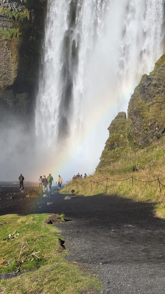 rainbow in the spray of a waterfall