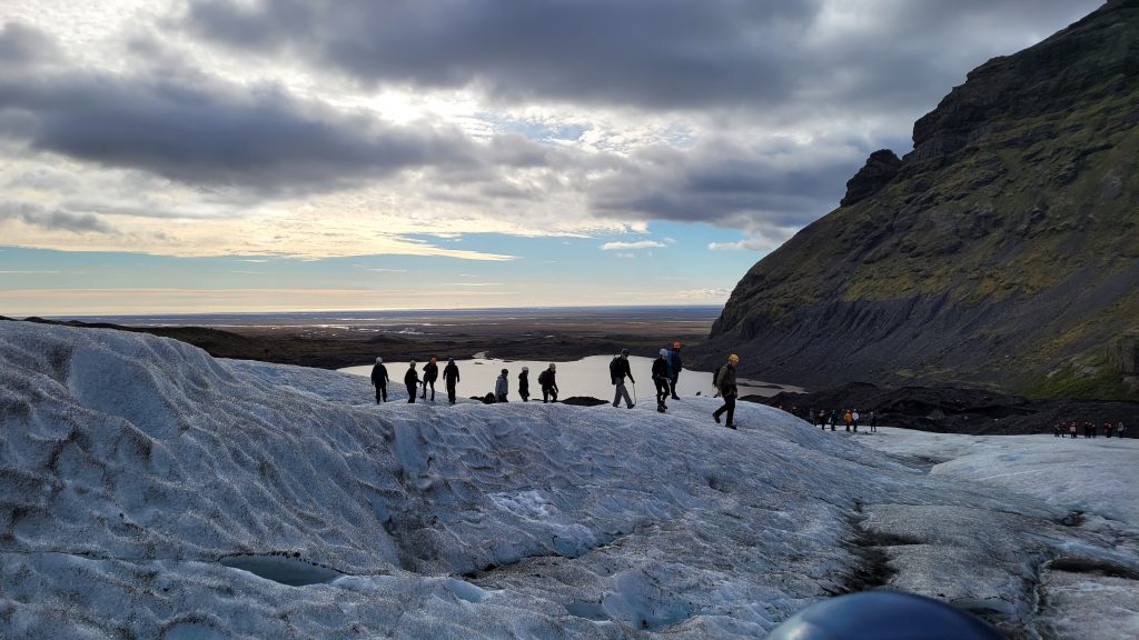 people walking on the glacier