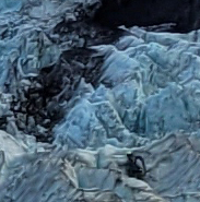 glacier hiker near black rock