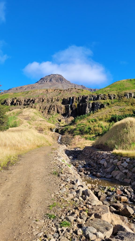 waterfall beside a path