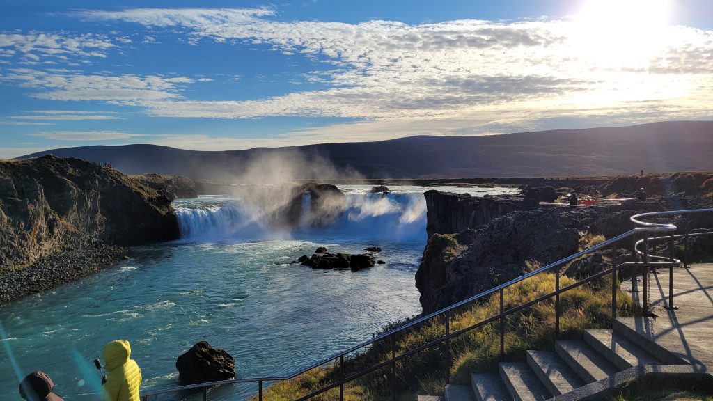 waterfall with blue skies