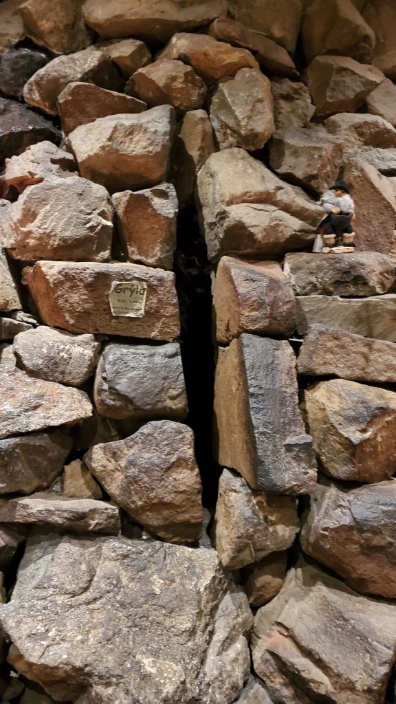 Slit in a rock wall structure.