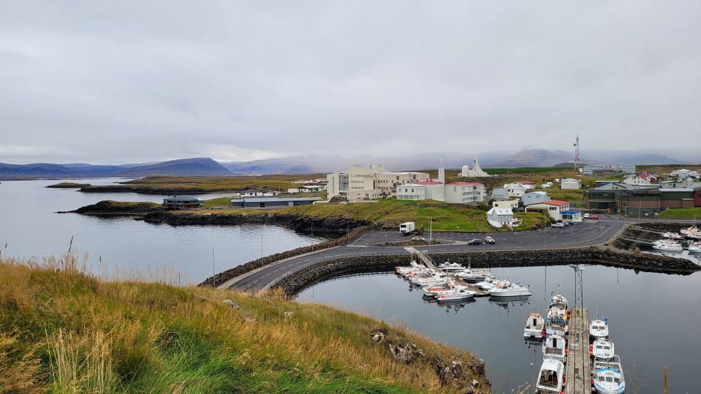 view of a marina with boats and a road