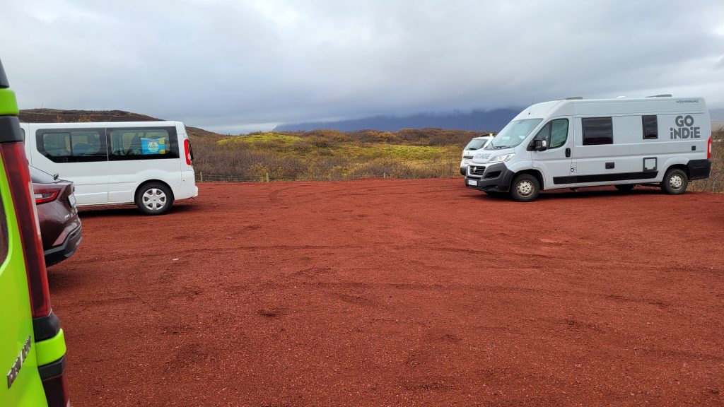 red gravel and dirt parking lot