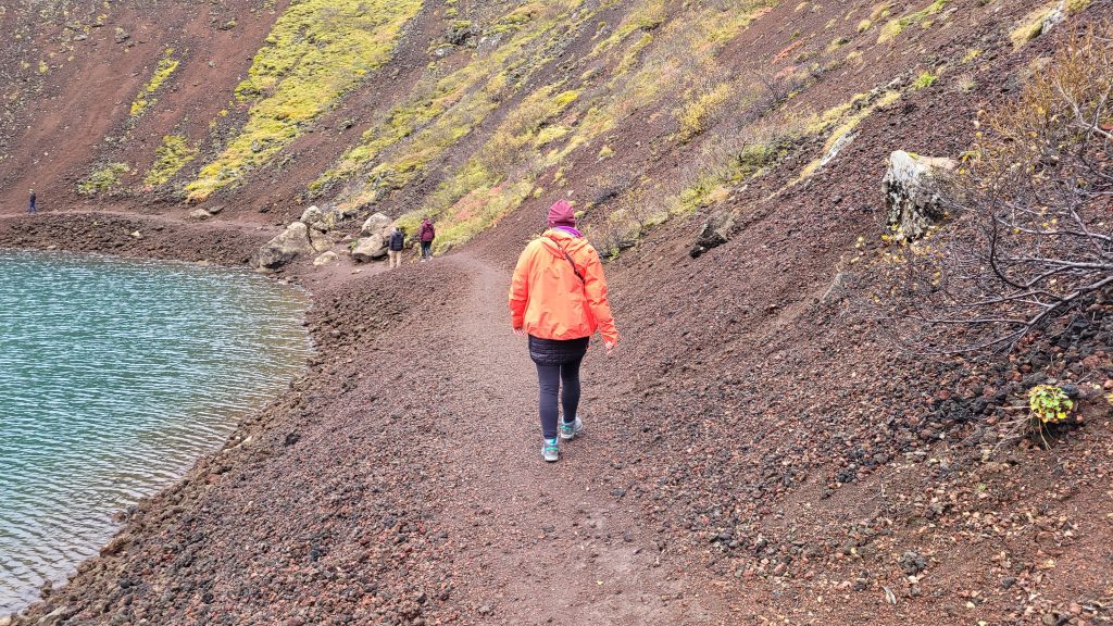 Susan walking along a trail