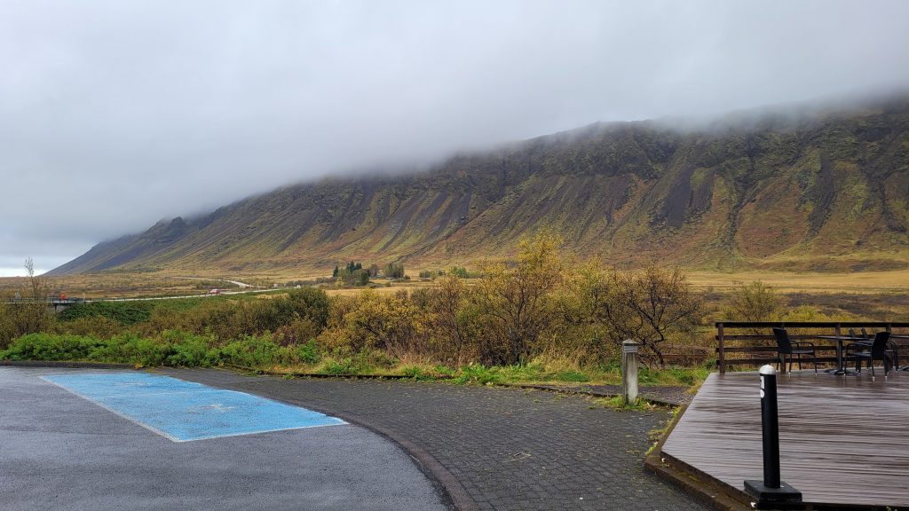 clouds spilling over mountains